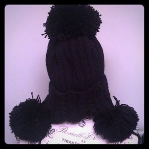 Cool snowball hat! Beautifully made black knit